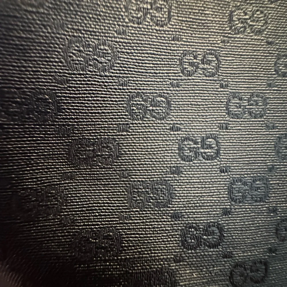 Gucci Black and Brown Vintage Travel Bag with micro GG logo pattern